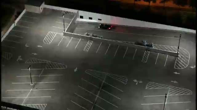 Ground-level night parking lot lineup